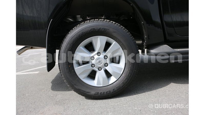 Big with watermark toyota hilux ahal import dubai 2081
