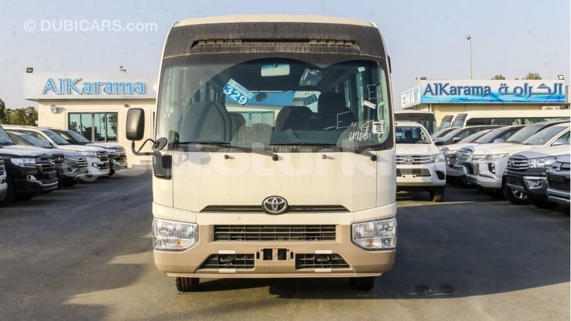 Big with watermark toyota coaster ahal import dubai 2942