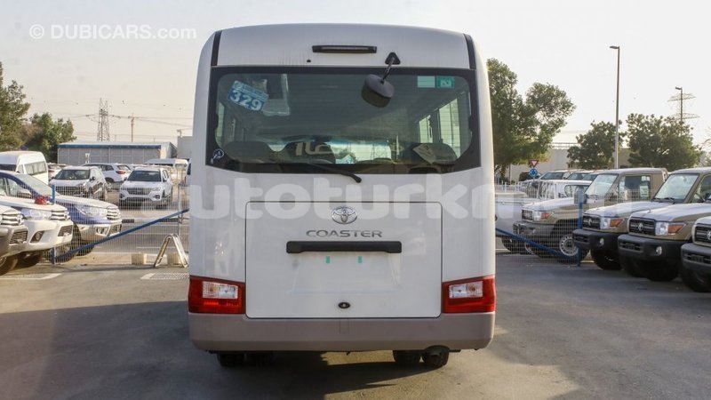 Big with watermark toyota coaster ahal import dubai 2942