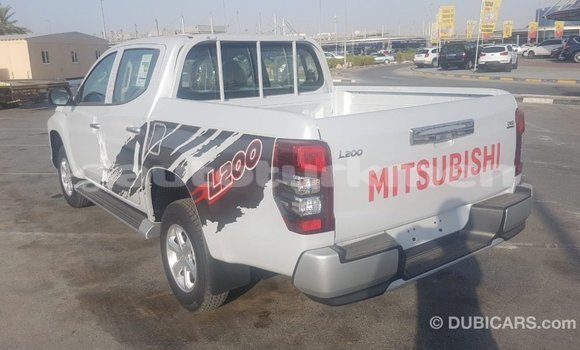 Buy Import Mitsubishi L200 White Car in Import - Dubai in Ahal Buy Import Mitsubishi L200 White Car in Import - Dubai in Ahal