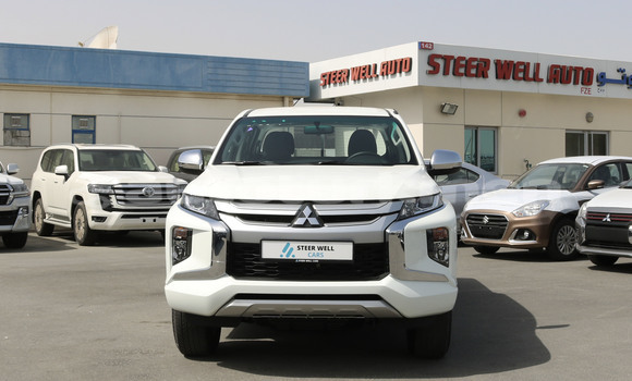 Buy Import Mitsubishi L200 White Car in Import - Dubai in Ahal Buy Import Mitsubishi L200 White Car in Import - Dubai in Ahal