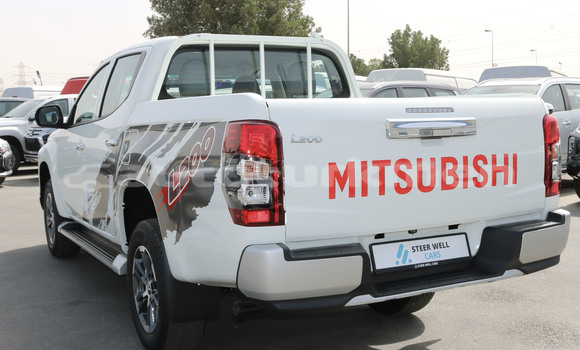 Buy Import Mitsubishi L200 White Car in Import - Dubai in Ahal Buy Import Mitsubishi L200 White Car in Import - Dubai in Ahal