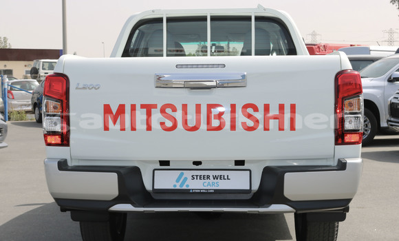 Buy Import Mitsubishi L200 White Car in Import - Dubai in Ahal Buy Import Mitsubishi L200 White Car in Import - Dubai in Ahal